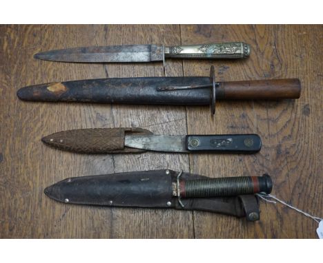 A William Rogers 'Cut My Way' knife and leather sheath, having 14cm blade; together with a Thomas Turner knife and leather sh