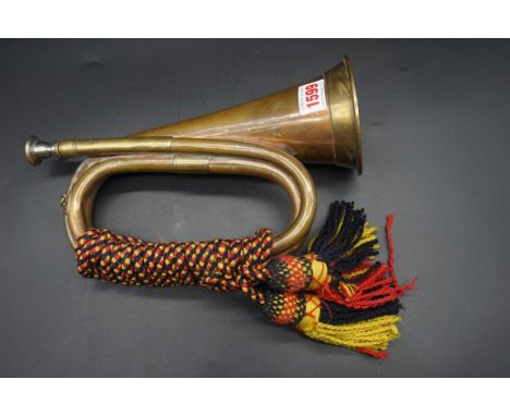 An old copper and brass bugle, inscribed 'John Grey &amp; Sons'.&nbsp;&nbsp; 