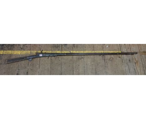 An antique matchlock musket, 166.5cm.IN HOUSE SHIPPING IS NOT AVAILABLE ON THIS ITEM.  