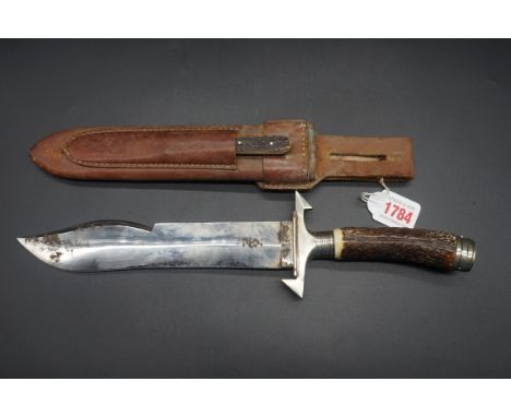 A rare German hunting knife and leather sheath, the 22cm blade inscribed 'F K L', with antler handle, the sheath with additio