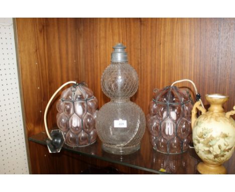 A VINTAGE SODA SIPHON TOGETHER WITH A PAIR OF VINTAGE GLASS LIGHT SHADES (3)