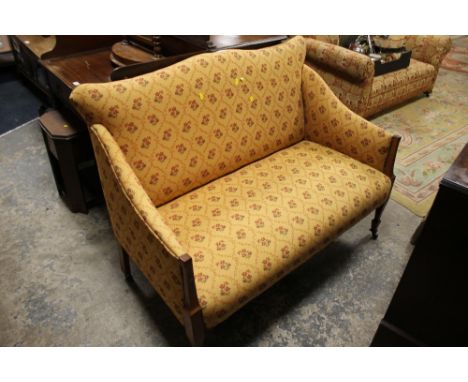 A SMALL UPHOLSTERED MAHOGANY FRAMED TWO SEATER SOFA W 122 CM