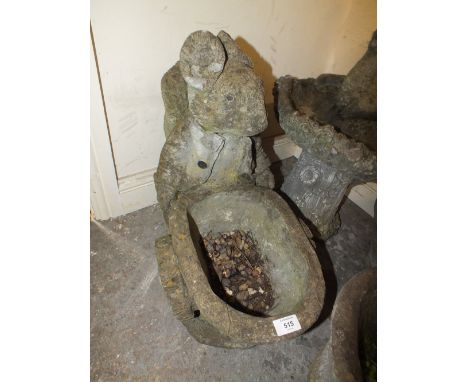 A SQUIRREL WITH WHEELBARROW GARDEN PLANTER
