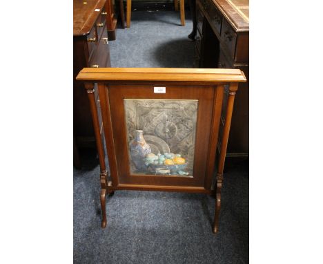 A MAHOGANY GLAZED FIRESCREEN WITH INSET WATERCOLOUR INITIALLED 'EA'