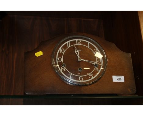 AN ENFIELD OAK MANTLE CLOCK 