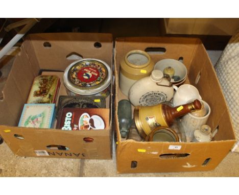 Two boxes of tins; a Bell's whisky decanter; a stoneware jar etc.
