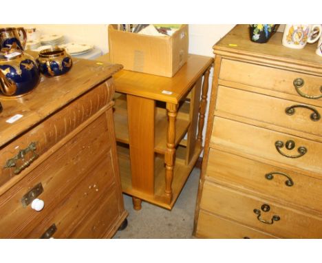 A light oak swivel bookcase