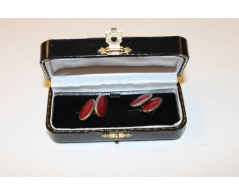 A pair of modern silver and red enamel cufflinks, stamped 925