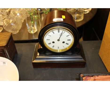 A mahogany two hole mantel clock