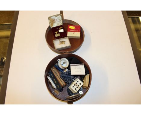 A brown leather collar box containing a miniature set of playing cards; Poker dice etc.