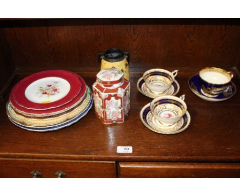 A 19th Century Chamberlain and Co. Worcester teacup and saucer; two Paragon tea cups and saucers; a floral decorated tea cadd