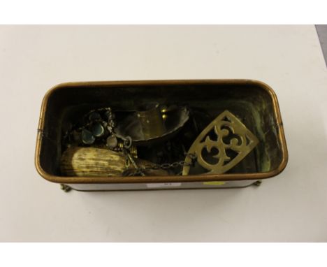 A copper jardini&egrave;re containing a horn flask; a small brass trivet; a compact etc.