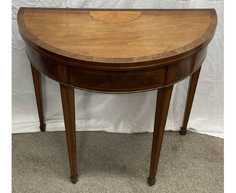 Early 20th century Georgian style fold over card table with inset sunburst veneer to top. Diameter 84cm