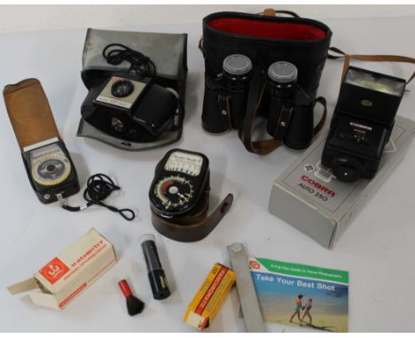 Brownie 127 camera, Spectator 8 x 30 binoculars, 2 light meters, Cobra flash gun and miscellaneous accessories