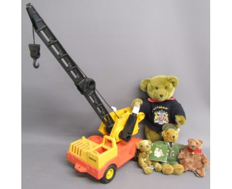 Harrod's teddy bears, Channel Island teddy and John West bear along with large Fisher Price crane