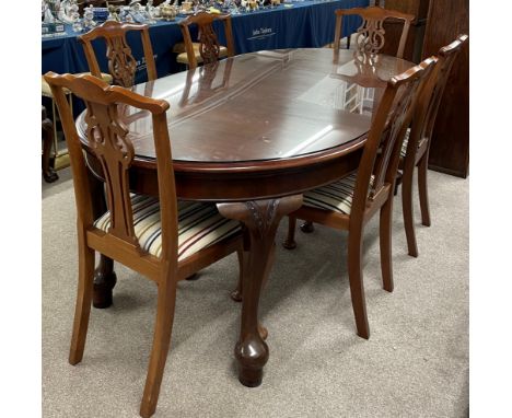 Early 20th century wind out dining table L 212cm W 107cm with a glass top &amp; 6 matching Chippendale influenced chair all i