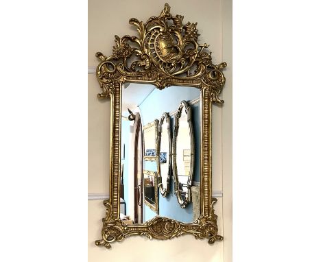 Large ornate gilt frame wall mirror in the Chippendale style 144cm by 80cm