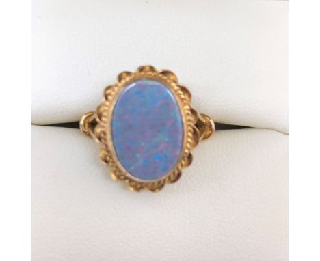 A 9ct gold opal ring