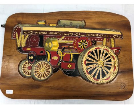 A wall hanging of a traction engine
