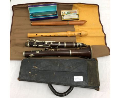 A quantity of musical instruments to inc clarinet, recorder and harmonicas