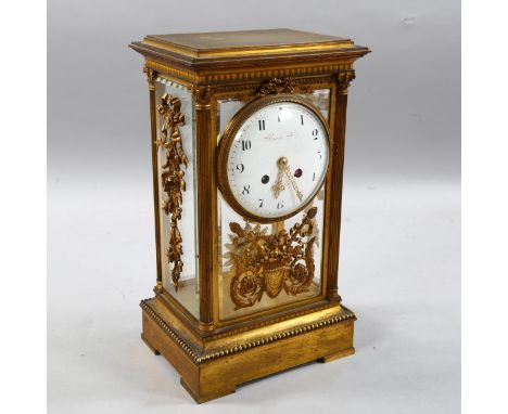 A mid 19th century French Four Glass clock by Raingo Feres, Paris,  8 day movement, case has bevelled glass and applied decor