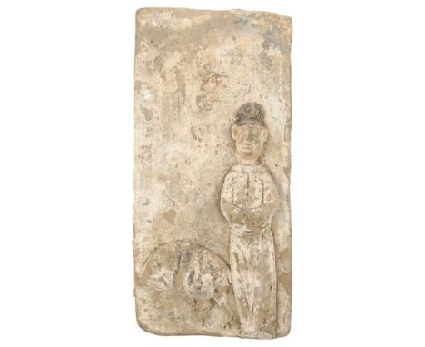 A large Chinese relief moulded pottery wall tile, possibly Jin Dynasty, height 35cm 
