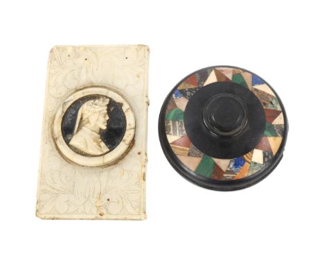 A 19th century black marble paperweight, inset with a band of specimen hardstone, diameter 10cm, and a 19th century alabaster