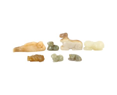 3 Chinese jade carvings, comprising a reclining figure (length 8cm), a mythical creature, and a Qilin, together with 4 other 