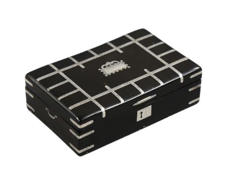 A fine quality French tortoiseshell and silver inlaid snuffbox, in the form of a travelling trunk, Paris marks circa 1850, 9.