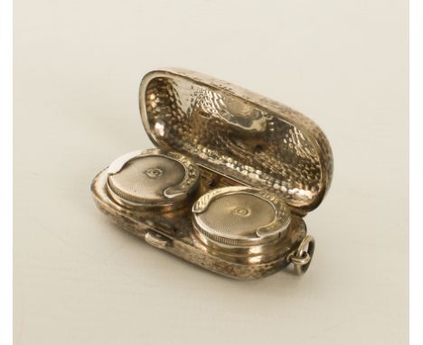 An Edwardian silver double-sovereign case -&nbsp;Aaron Lufkin Dennison, Birmingham 1910, of rounded oblong form and with plan