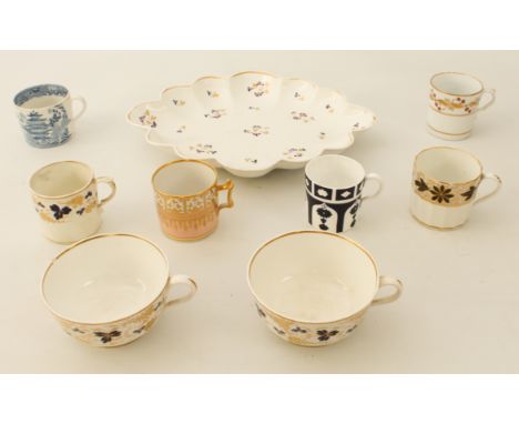 Nine pieces of 19th century English porcelain: 1. a Derby scalloped dish with sprigged floral decoration, 30.75 cm long, iron