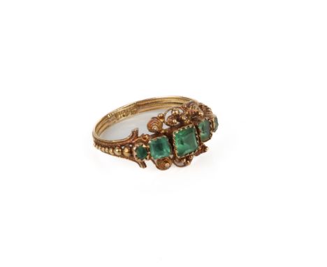 A 15ct gold and emerald five stone ring - probably Indian, first half 20th century, unmarked, tests as 15ct gold, with five s