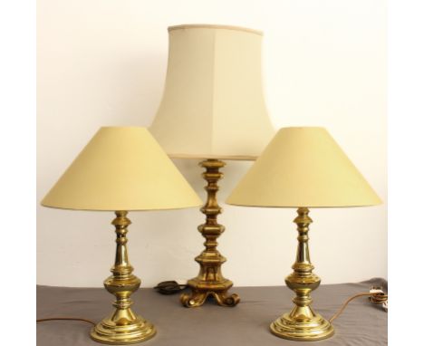 A pair of brass table lamps - 34 cm high, plus shades; together with a giltwood table lamp in the style of an 18th century It