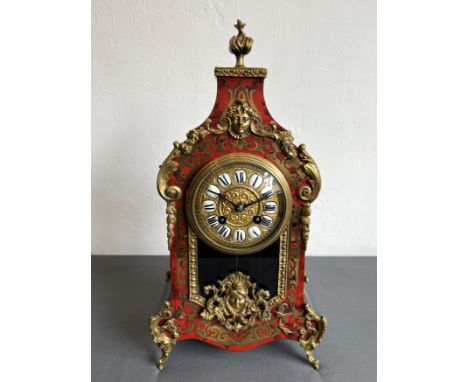 A French Boulle type mantel clock, late 19th century - the half hour&nbsp;gong striking movement with three stars on a banner