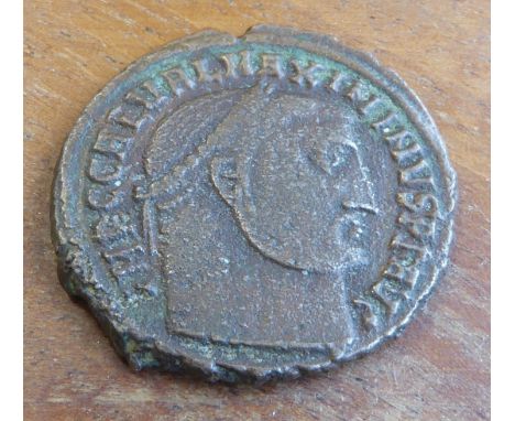 A Maximinus II bronze follis (Augustus, Alexandra Mint 308-310 AD):  Obverse - IMP C GAL VAL MAXIMINVS P F AVG, laureate head