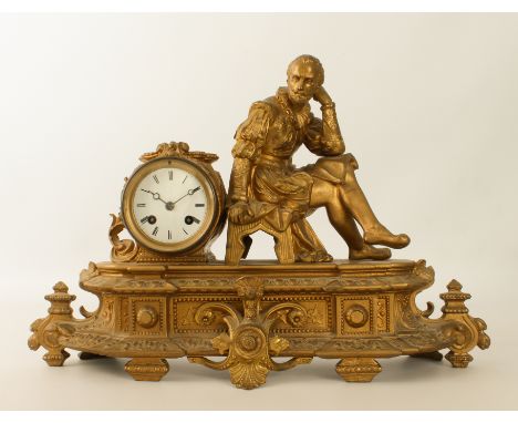 A French gilt-spelter mantel clock - early 20th century, the case with a seated figure of William Shakespeare beside a drum-c