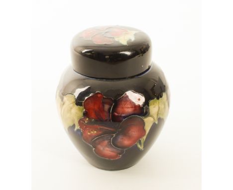 A small Walter Moorcroft ginger jar in the 'Hibiscus' pattern - 1950s-60s, 'late Queen Mary' paper labels to jar and lid and 