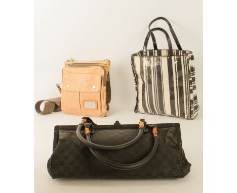 Three vintage handbags: 1. a Gucci black monogram fabric shoulder bag, with black leather base, two bamboo and leather top ha