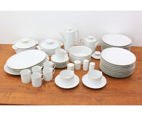 An extensive white and gilt glazed porcelain part-dinner-service by Thomas of Germany: 18 x 26.5 cm dinner plates; 16 x 21 cm