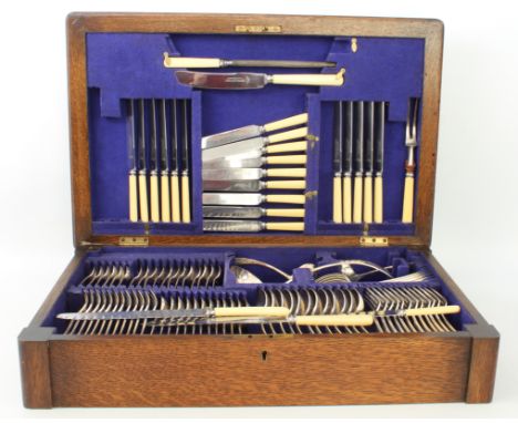 An oak canteen of silver plated Old English pattern flatware - 1930s-40s, twelve place settings, by Joseph Rodgers, comprisin