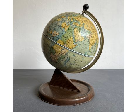 A 1950s Chad Valley tinplate childs or school globe - 27 cm high.