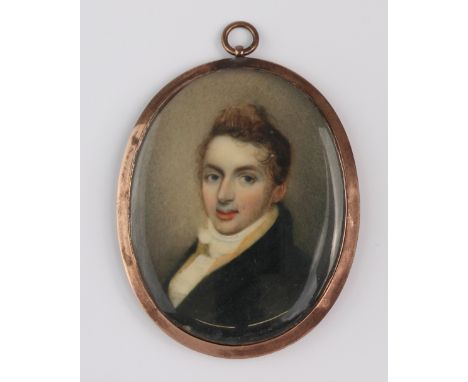 An English School, early 19th century portrait miniature of a gentleman - watercolour on ivory, wearing a black coat, cream w