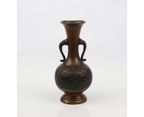 An early Oriental bronze vase.