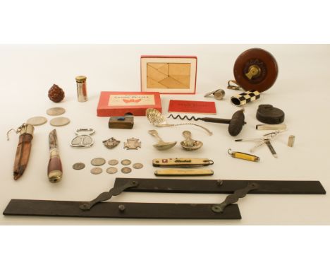 A small box of collectables - including a 19th century corkscrew; two Victorian silver prize medals; a copper matchbox cover 