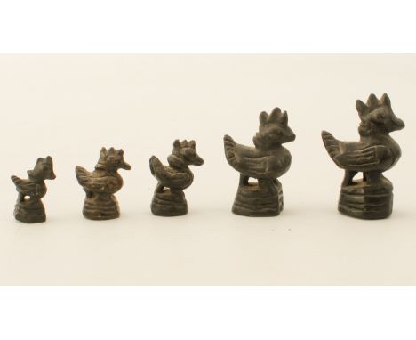 Five Oriental bronze opium weights - 20th century, of typical Mandarin duck form, height from 2.4cm to 4.4cm high.