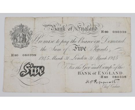 A British 1945 Bank of England five pound banknote - signed K. O. Peppiatt, serial no. H80 080338, creased and folded, severa