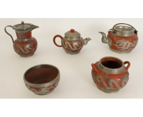 A Chinese pewter mounted Yixing red terracotta five-piece tea service - early 20th century, comprising a large teapot with tw