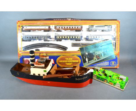 A Model Train 'Orient Express' by Lima together with a model boat 'Duchess of Kent' and a tin plate toy 