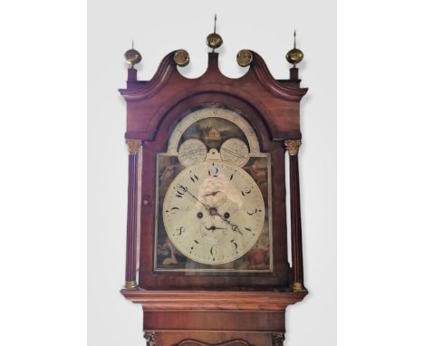 A 19th Century Oak And Mahogany Long Case Clock, the arched hood with swan neck pediment and brass finials above a shaped doo