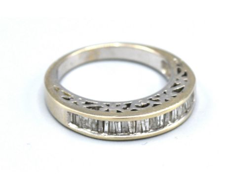 A 14ct. White Gold Half Eternity Ring set with baguette diamonds, 5gms. ring size N 